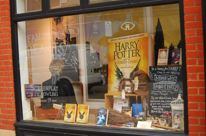 Norwich, United Kingdom- August 1, 2016: Window at Bookstore in Norwich advertises the new book on the Harry Potter series