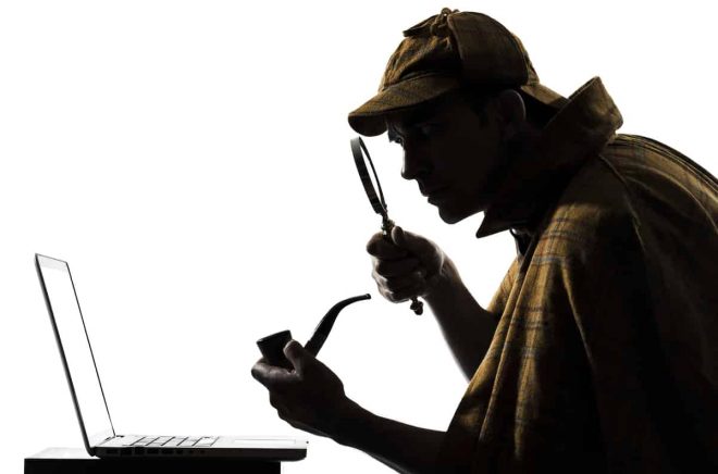 Sherlock Holmes laptop computer silhouette in studio on white background