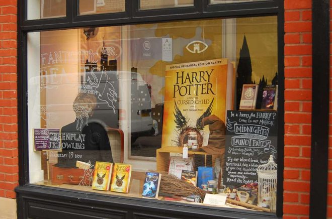 Norwich, United Kingdom- August 1, 2016: Window at Bookstore in Norwich advertises the new book on the Harry Potter series